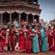 Women queue to do puja at the Krishna temple in Patan, Kathmandu on Krishna's birthday.  this temple is said to be the most revered stone monument int he tiny country.  Many waited in temperatures exceeding 35degrees for hours in order to honor Lord Krishna on this special day.