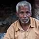This sabji-wallah (vegetable seller) sits on a 1m x 2m wooden bench in the narrow alleys of Rishikesh market.  Today he sells mooli (white radish) for rs10/kg, dania (coriander leaf) for rs5 per bunch, and palak (spinach) at rs7 per bunch.  There are about 75 rupeees to the pound.