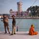 A baba (holy man) smokes a chillum (clay pipe) on the banks of the Ganges during the Kumbh Mela on one of the quieter bathing days in February 2010.  Lord Shiva smoked charas (hasshish), thus linking religion and drugs in India in a way which is quite unthinkable in the UK.